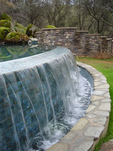 Jim Chandler Pools, 310 gallons per minute flowing over the edge!