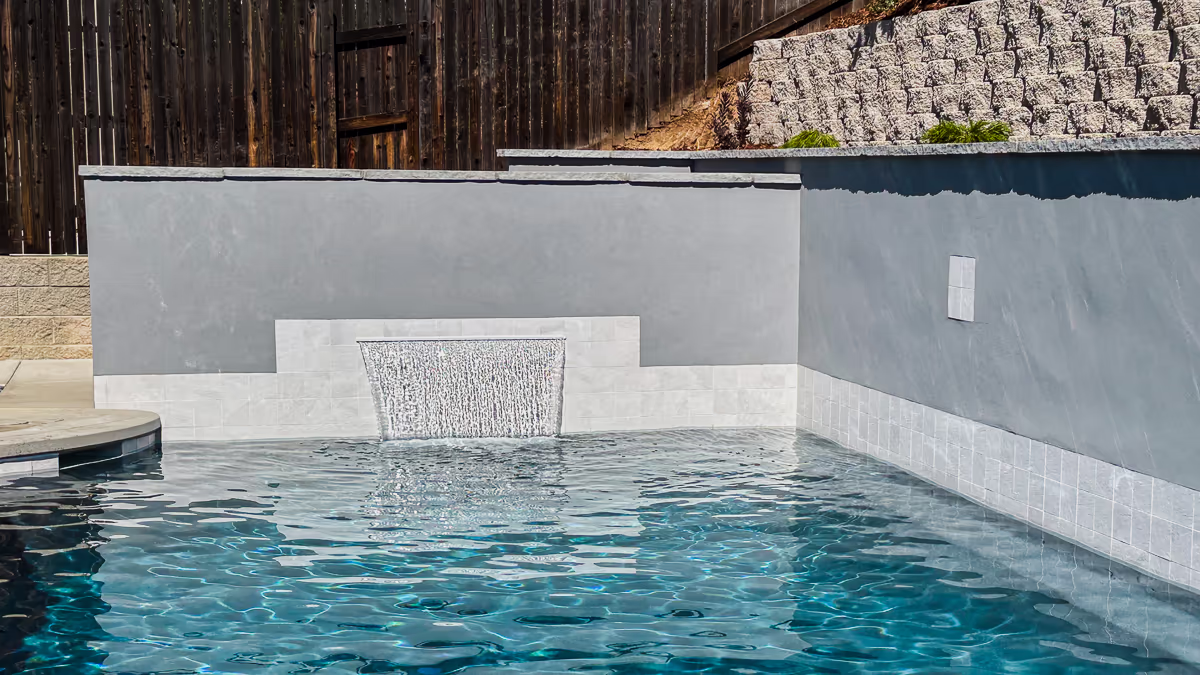 48-inch CMP Classic Falls sheer descent waterfall — Tahoe Blue plaster, Slate White tile at the waterline