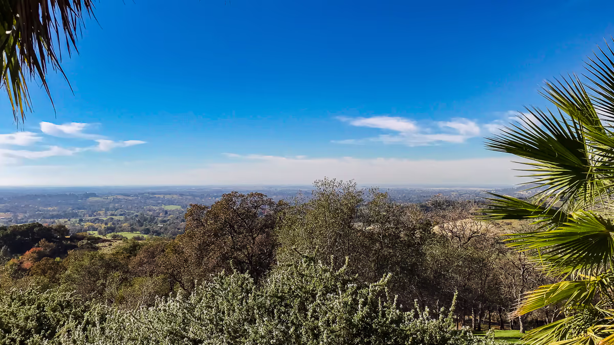 Panoramic Sacramento Valley view from the Auburn hillside — the view that defined the vanishing edge pool design by Jim Chandler Pools